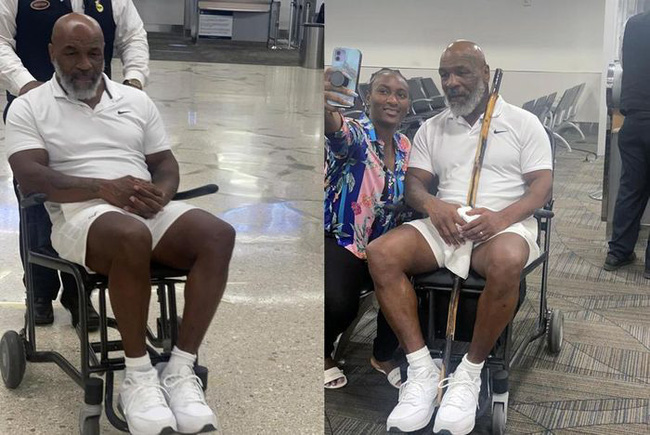 Mike Tyson tiều tụy ngồi xe lăn
