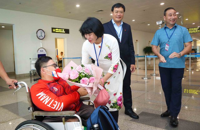Đoàn Thể thao người khuyết tật Việt Nam về nước sau thành công lớn tại kỳ đại hội ASEAN Para Games 11 - Ảnh 3. Đoàn Thể thao người khuyết tật Việt Nam về nước sau thành công lớn tại kỳ đại hội ASEAN Para Games 11 - Ảnh 3.