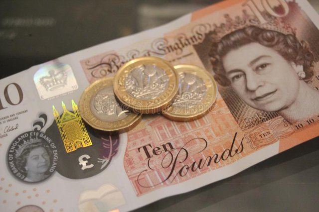 Tại sao Vua Charles III lại in mặt trái lên tiền xu, còn Nữ hoàng Elizabeth II lại là mặt phải? - Ảnh 2. Tại sao Vua Charles III lại in mặt trái lên tiền xu, còn Nữ hoàng Elizabeth II lại là mặt phải? - Ảnh 2.