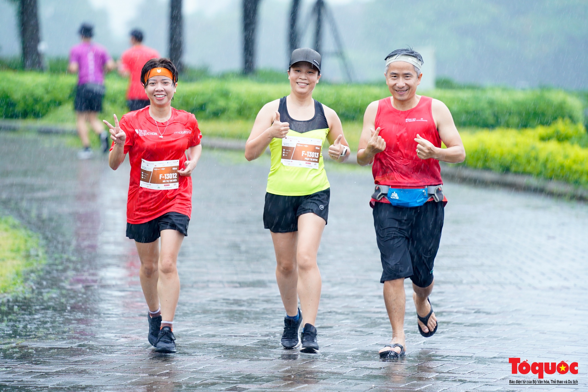 500 nhà báo chinh phục giải chạy Press Marathon 2023 dưới cơn mưa lớn - Ảnh 16.