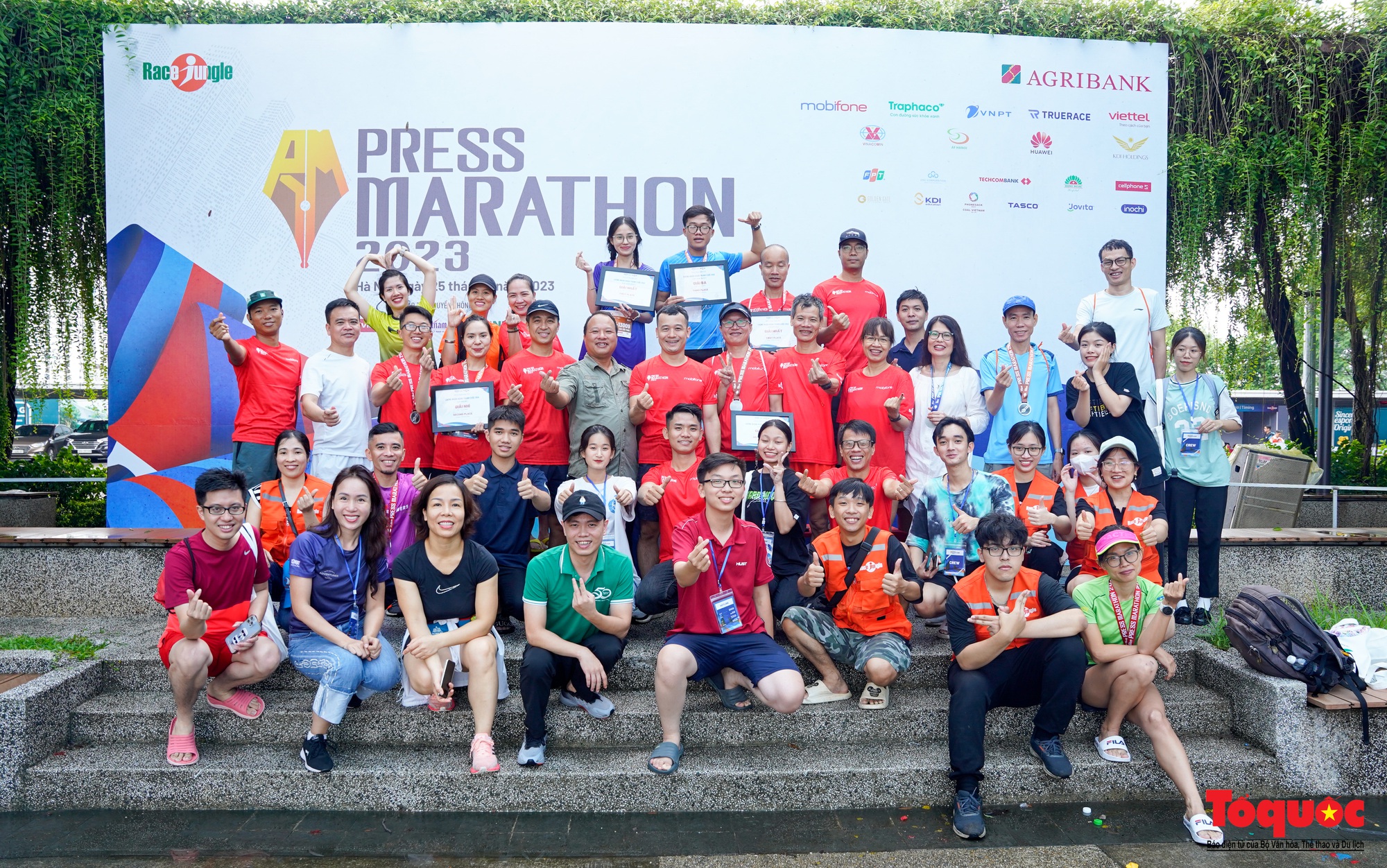 500 nhà báo chinh phục giải chạy Press Marathon 2023 dưới cơn mưa lớn - Ảnh 26.