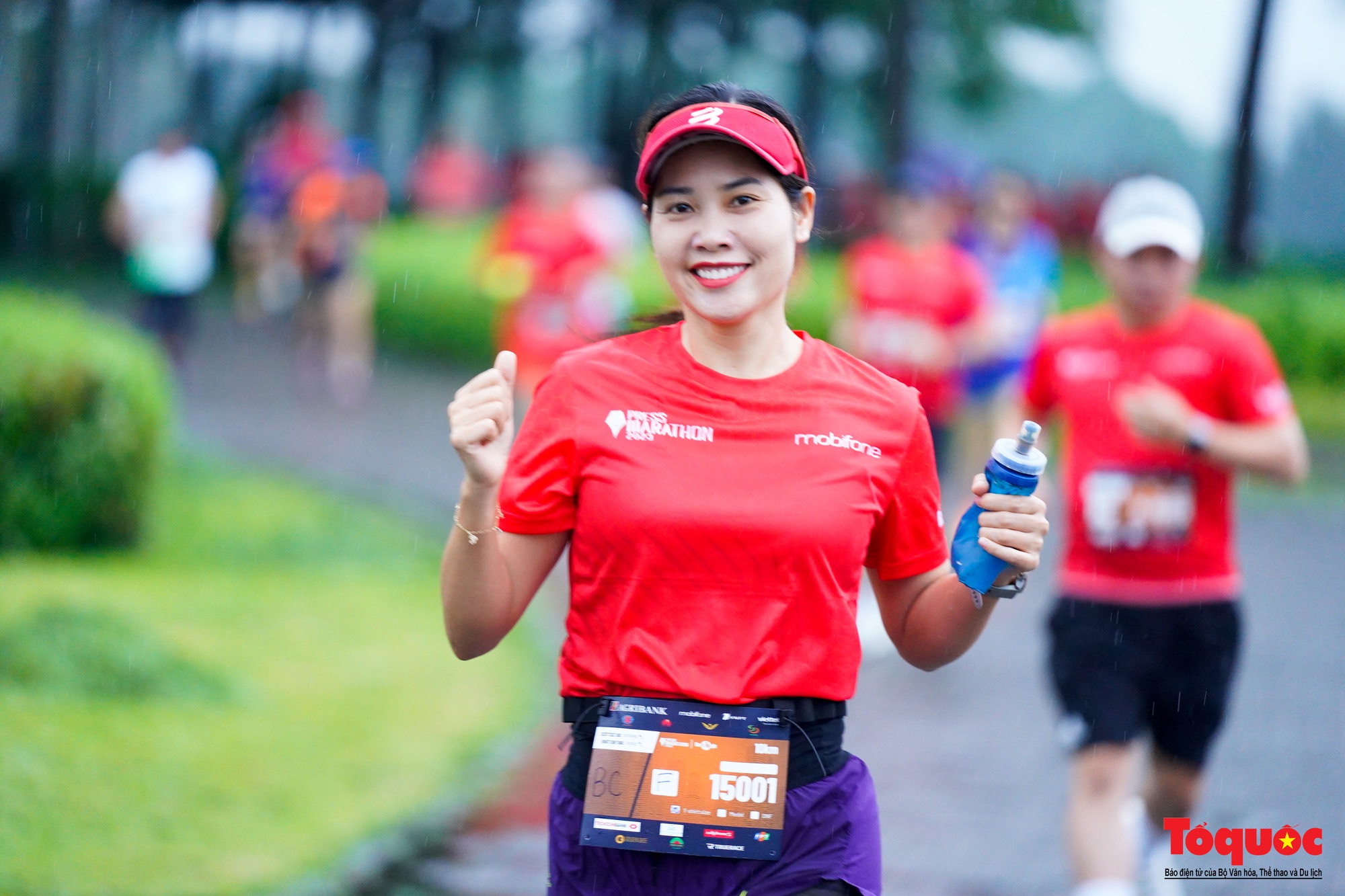 500 nhà báo chinh phục giải chạy Press Marathon 2023 dưới cơn mưa lớn - Ảnh 15.