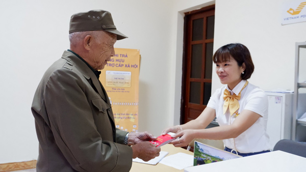 Chi trả trợ cấp an sinh xã hội trước ngày 3.2- Ảnh 1. Chi trả trợ cấp an sinh xã hội trước ngày 3.2- Ảnh 1.