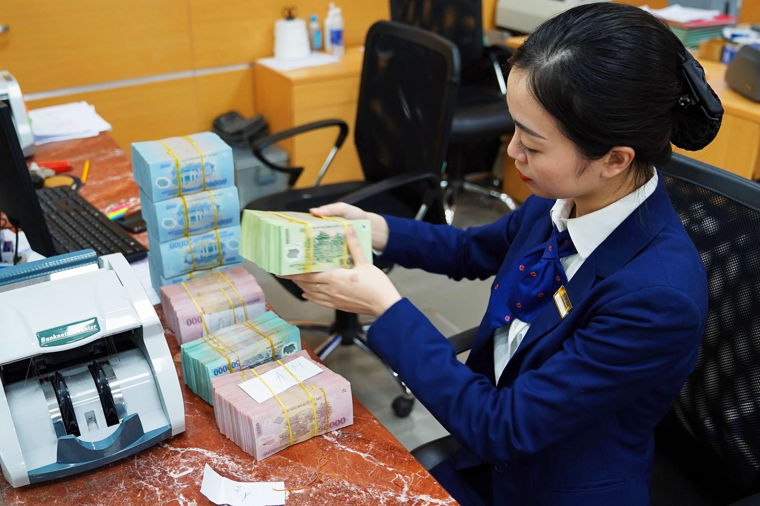 Khơi thông dòng chảy tín dụng- Ảnh 1. Khơi thông dòng chảy tín dụng- Ảnh 1.