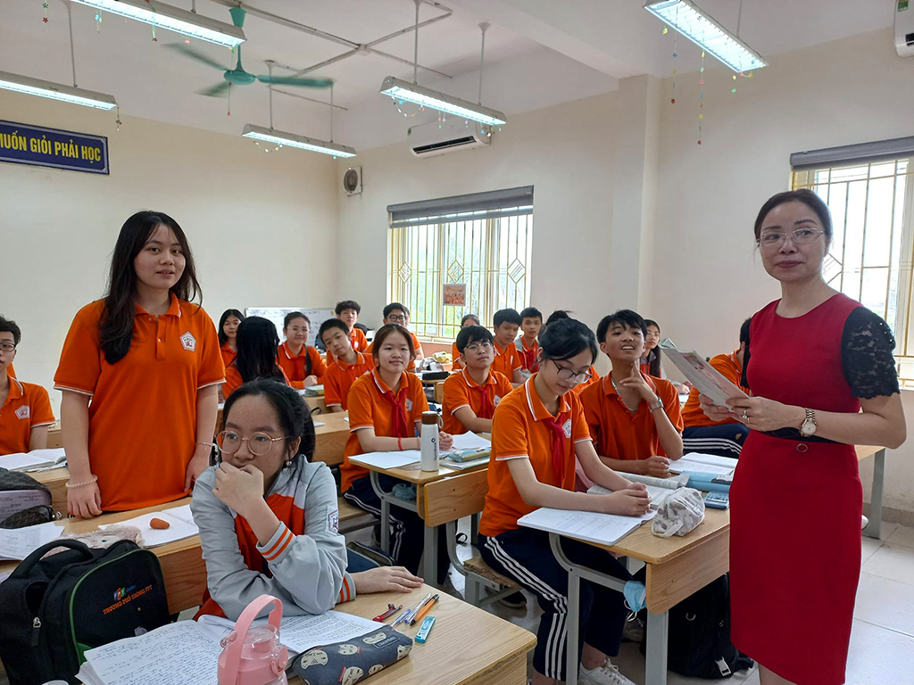 Học sinh lớp 9 Trường THCS Nguyễn Trãi (Hà Nội) trong giờ học chuẩn bị cho kỳ thi lớp 10 sắp tới
